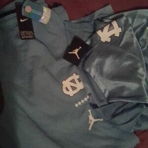 (New) Nike official on field apparel sweat pants/jersey (Carolina blue) size lrg